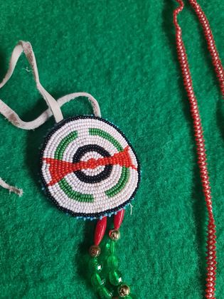 Beaded rosette ornament with hairpipe, glass crystal and feather-fluff drop, plate 118