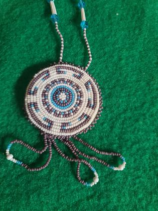 Beaded medallion necklace with lavender and turquoise concentric rosette, plate 123