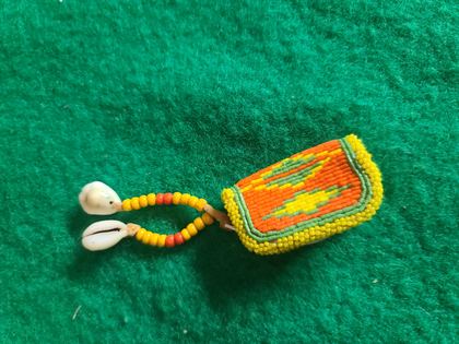 Small beaded flap pouch with cowrie-shell drops, plate 126