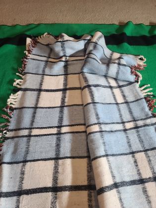 Reversible coarse-woven plaid wool throw, rust and cream one face / pale blue and cream the other, macrame-knotted fringe, plate 141
