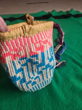 Plateau twined yarn round bag ("sally bag" form) with buckskin rim, plate 17