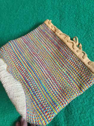 Plateau-style twined wool "sally bag" with hide-bound rim, plate 172