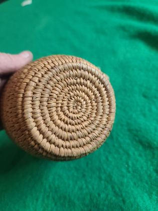 Small plain coiled cedar-root basket with cordage loops, plate 186