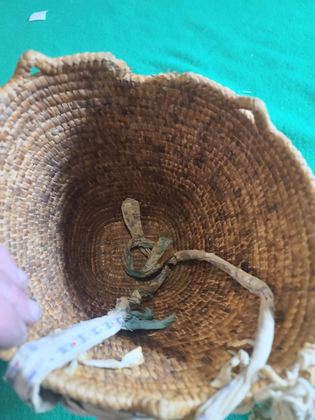 Fully imbricated polychrome Klickitat-type huckleberry basket with cloth-bound rim and cotton tumpline, plate 191