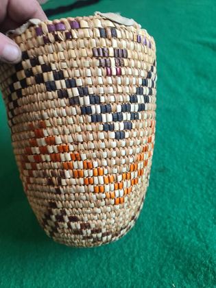 Fully imbricated coiled cedar-root berry basket with hide rim loops, plate 199