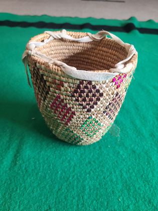 Polychrome imbricated coiled berry basket with pale buckskin rim binding, plate 211