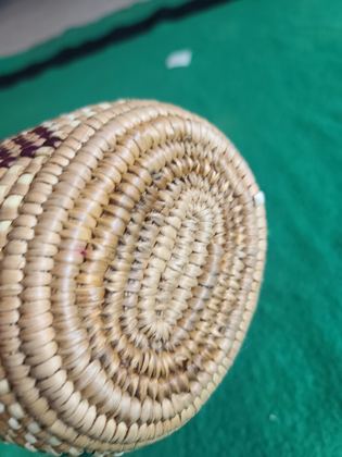 Polychrome imbricated coiled berry basket with pale buckskin rim binding, plate 215