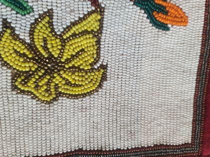Small Plateau contour-beaded floral bag on bone hairpipe strap, plate 37