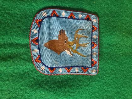 Beaded pictorial panel with bull elk on blue ground, plate 41