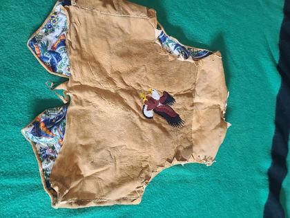 Beaded hide vest with pictorial bald eagle and hourglass front panels