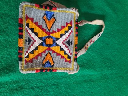 Fully-beaded geometric flat purse with beaded carrying strap